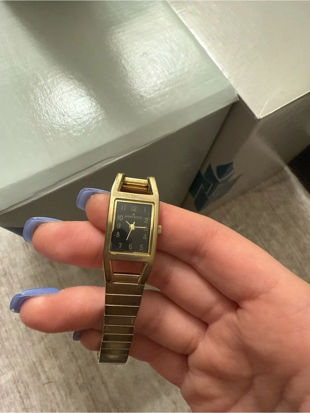 Anne Klein Gold and Black Rectangular Women's Watch - requires battery